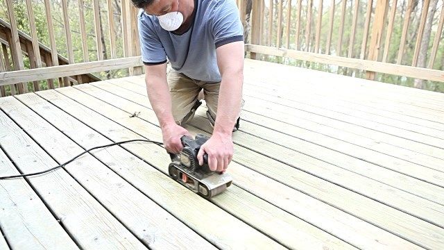 Sanding a deck