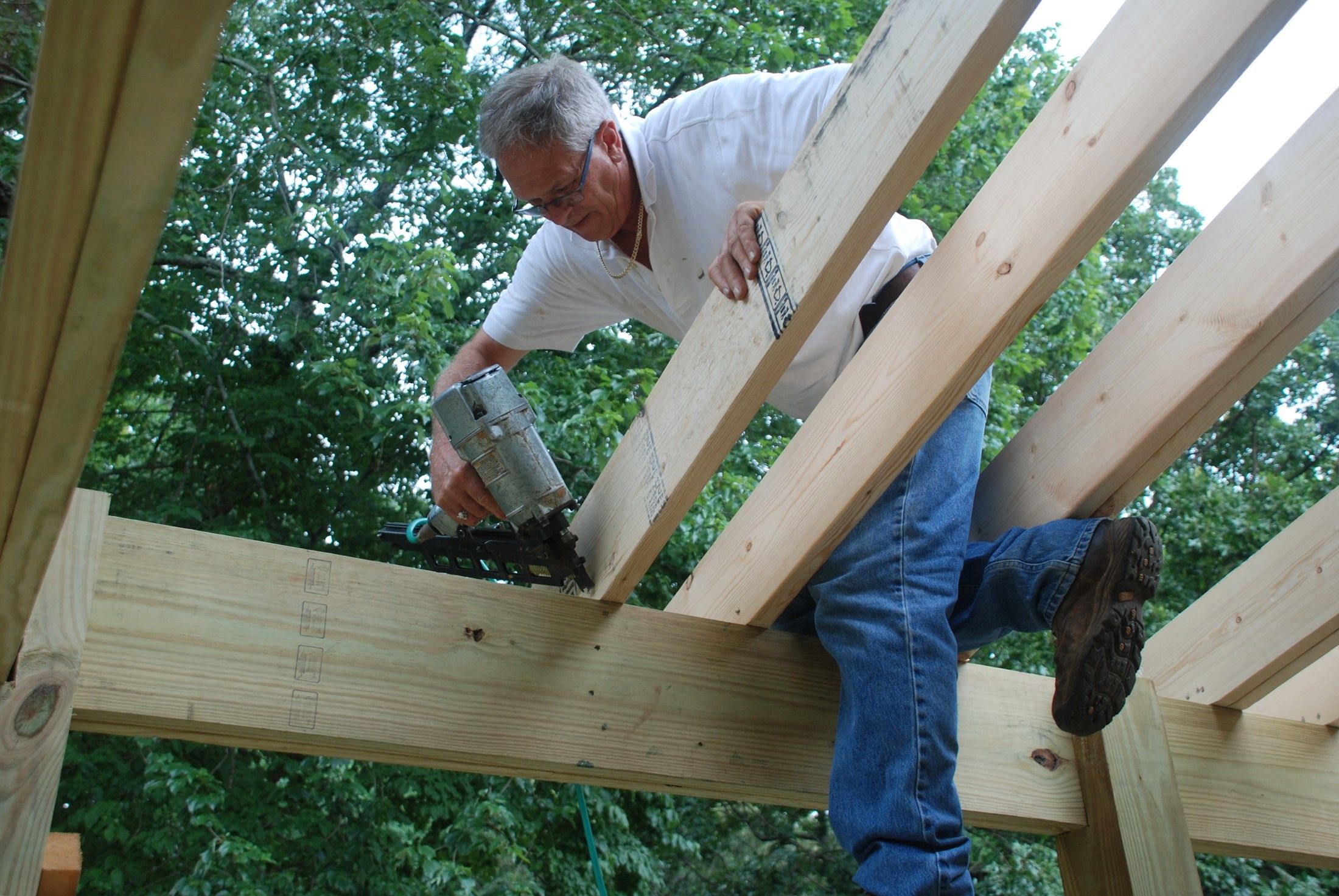 who build roofs over decks orchard park ny