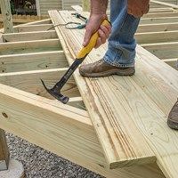 Framing a Deck Parallel to a House | Decks.com