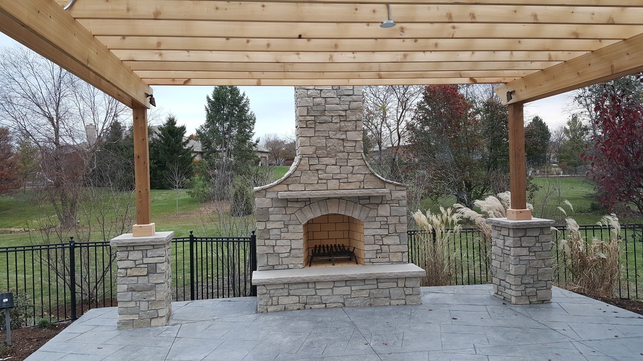 Decks.com. Pergola with Stone Columns - Picture 3633