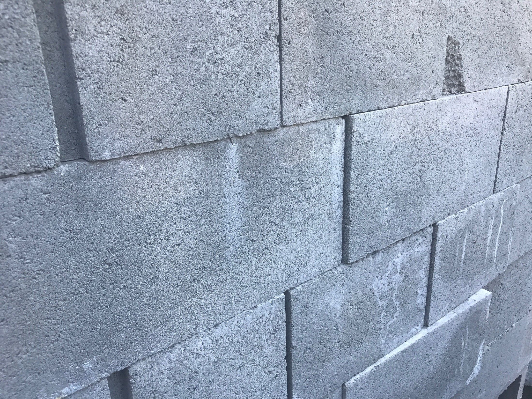 Can I attach my deck to a hollow block concrete foundation? | Decks.com